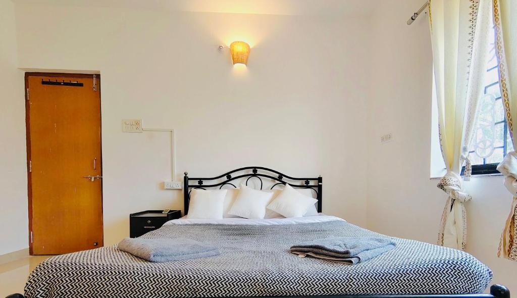 Ένα ή περισσότερα κρεβάτια σε δωμάτιο στο Polka BnB