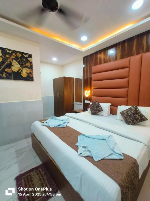 Postel nebo postele na pokoji v ubytování Hotel Small Daddy Plus
