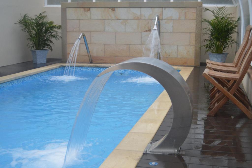 The swimming pool at or near Hotel Balneario De Alceda