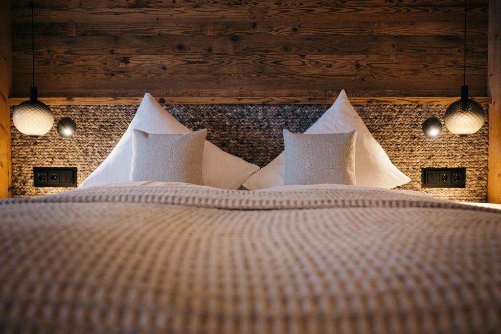 Postel nebo postele na pokoji v ubytování Premium Activehotel Bergkönig