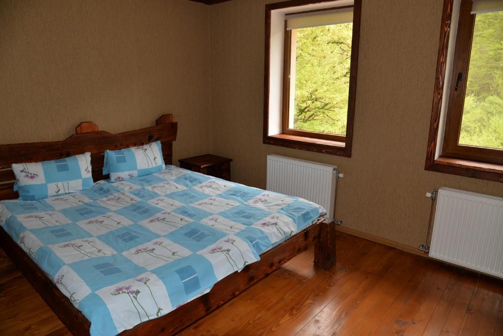 Postel nebo postele na pokoji v ubytování Syni Potoky