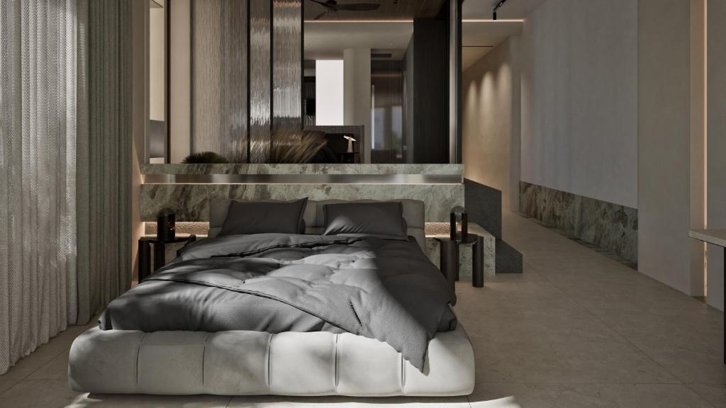 Кровать или кровати в номере Dyo Suites