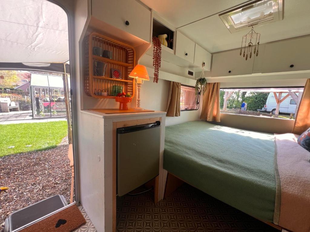 Postel nebo postele na pokoji v ubytování Camping Wijndomein Erve Wisselink