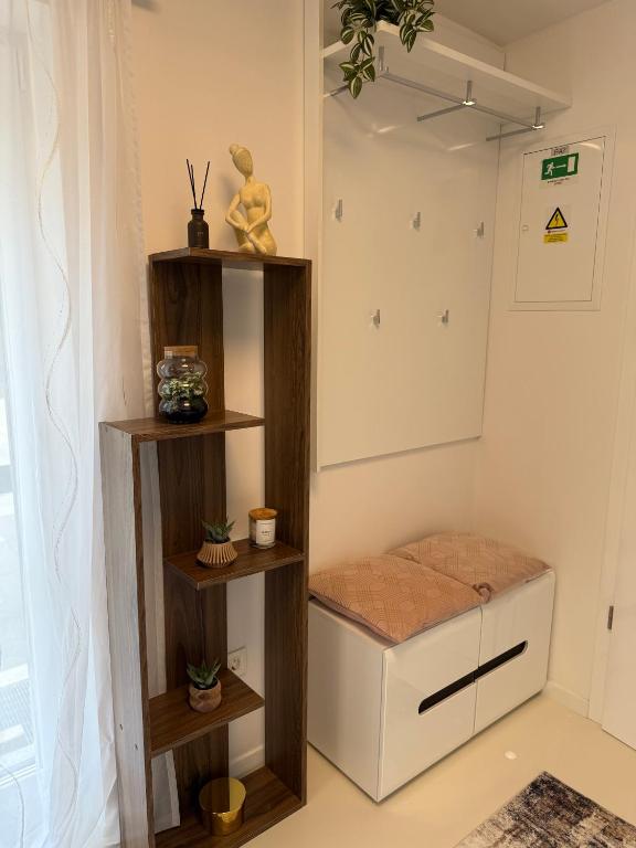Postel nebo postele na pokoji v ubytování Apartmani Beril Lux