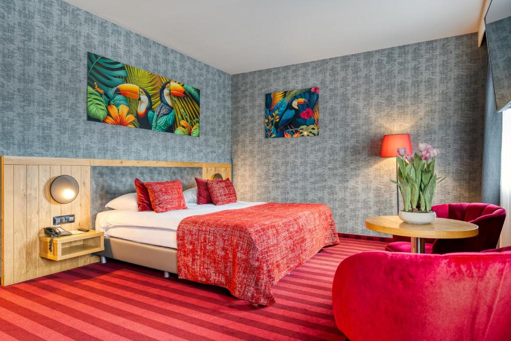 Postel nebo postele na pokoji v ubytování Hotel Verviers Van der Valk