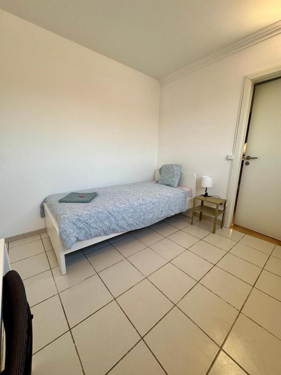 Postel nebo postele na pokoji v ubytování Smart & Cheap Stay for 1 person