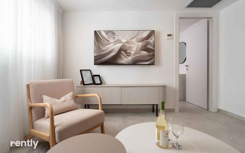 TV&#47;Unterhaltungsangebot in der Unterkunft Luxury Apartments And Studios At Sea Side By Rently
