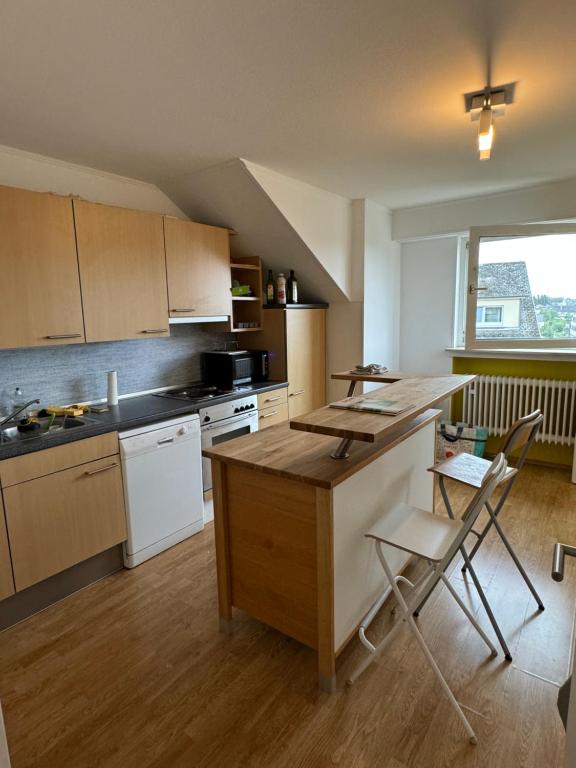 Kuchyň nebo kuchyňský kout v ubytování Smart & Cheap Stay for 1 person