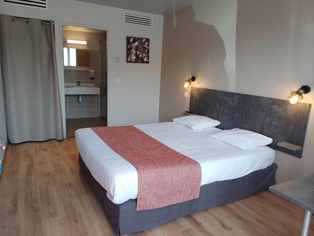 Postel nebo postele na pokoji v ubytování Hotel Restaurant L'Espassole