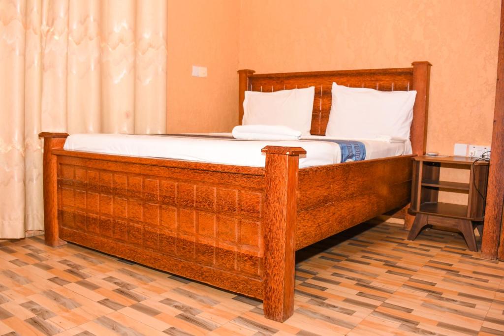 Postel nebo postele na pokoji v ubytování Best Point Hotel Zanzibar