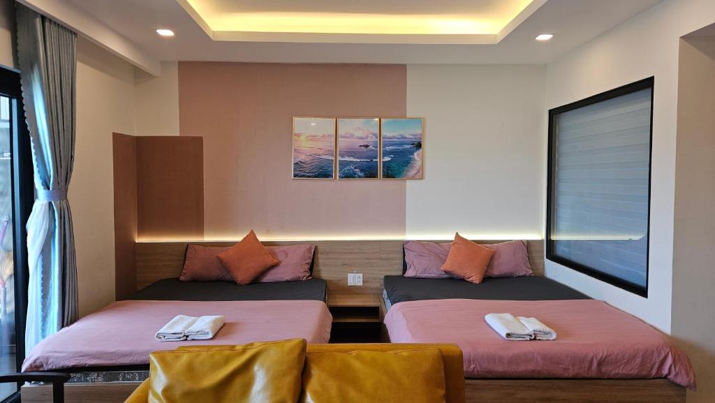 Postel nebo postele na pokoji v ubytování Flc Sea Tower - ChillNow Căn hộ nghỉ dưỡng Quy Nhơn