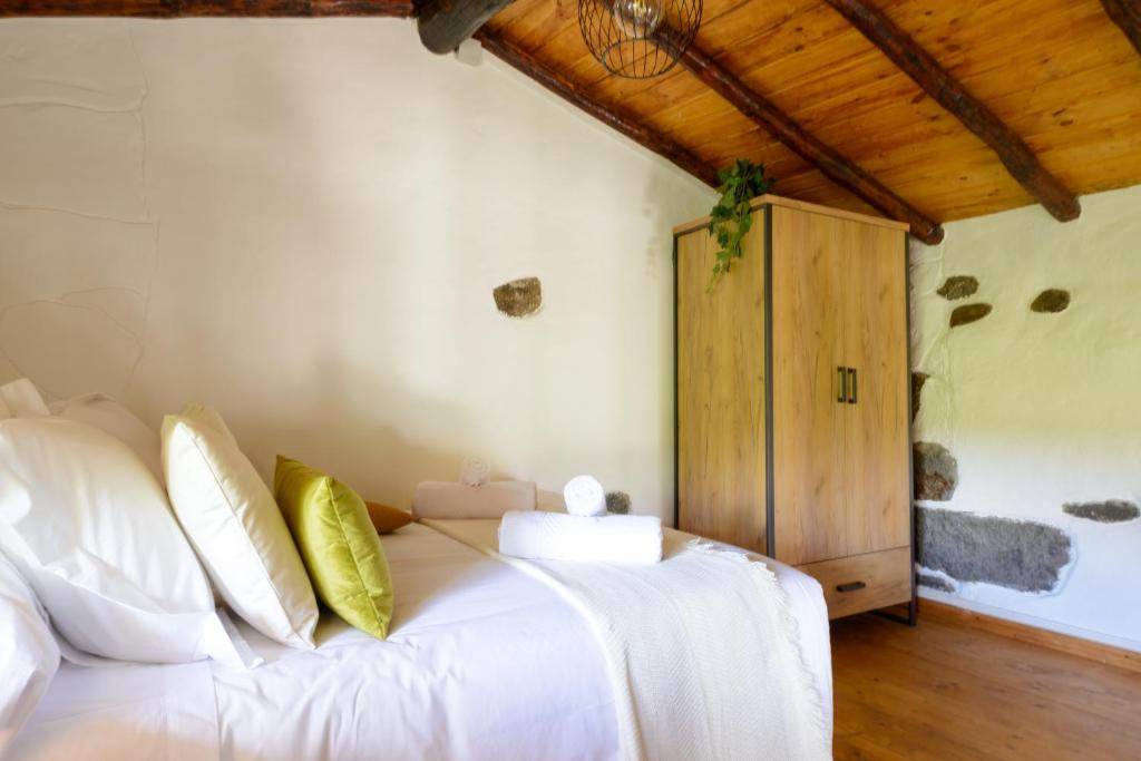 Postel nebo postele na pokoji v ubytování Quinta entre palmeras