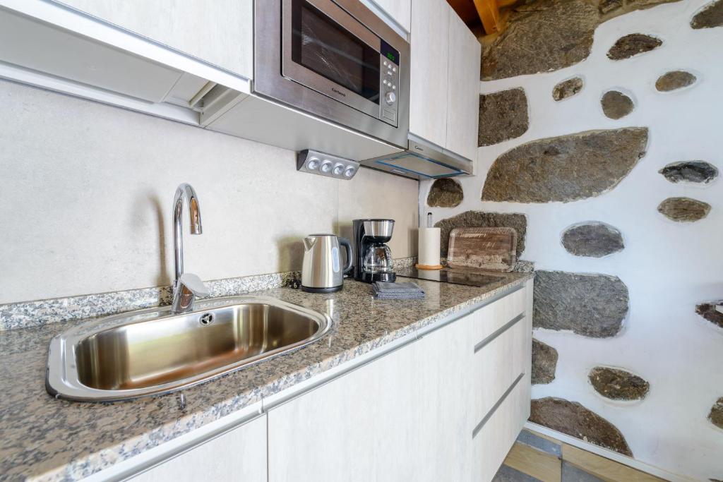 Kuchyň nebo kuchyňský kout v ubytování Quinta entre palmeras