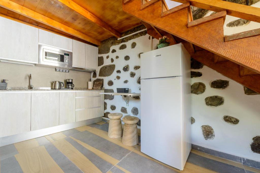 Kuchyň nebo kuchyňský kout v ubytování Quinta entre palmeras