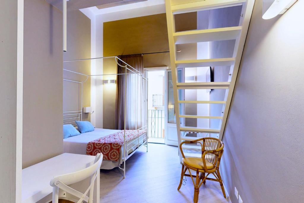 Postel nebo postele na pokoji v ubytování Aegusa Hotel
