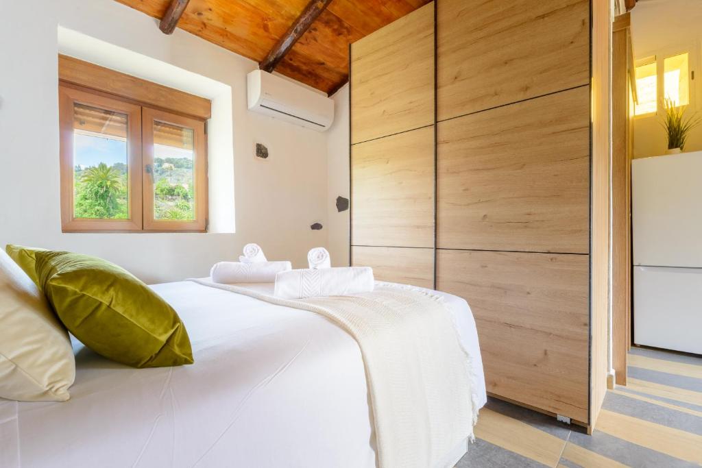 Postel nebo postele na pokoji v ubytování Quinta entre palmeras