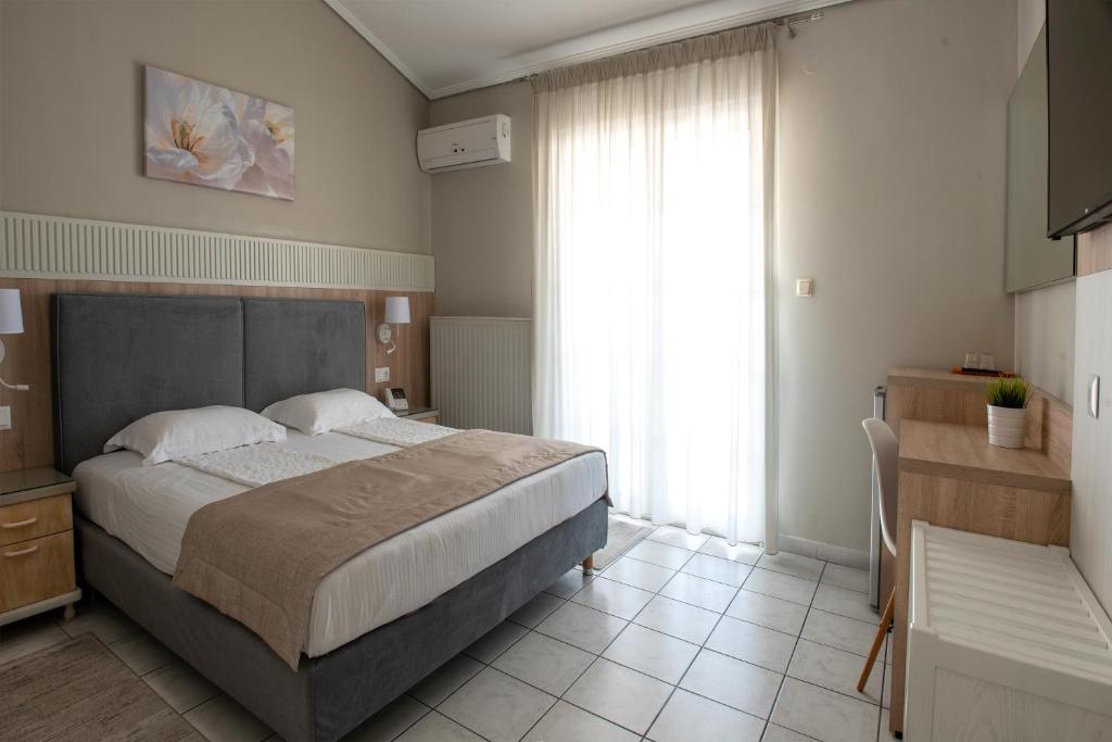 Postel nebo postele na pokoji v ubytování Hotel Strass
