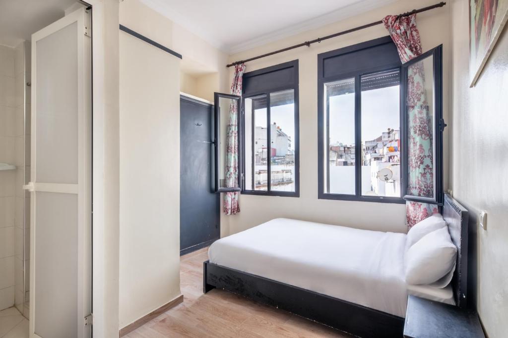 Rúm í herbergi á Hotel Mauritania