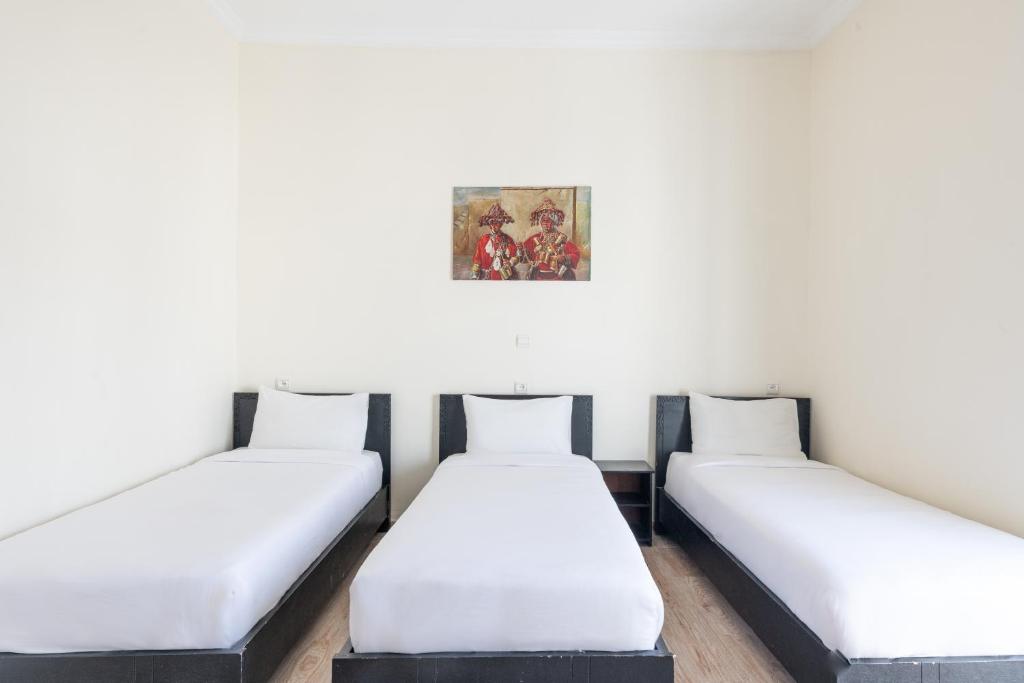 Rúm í herbergi á Hotel Mauritania