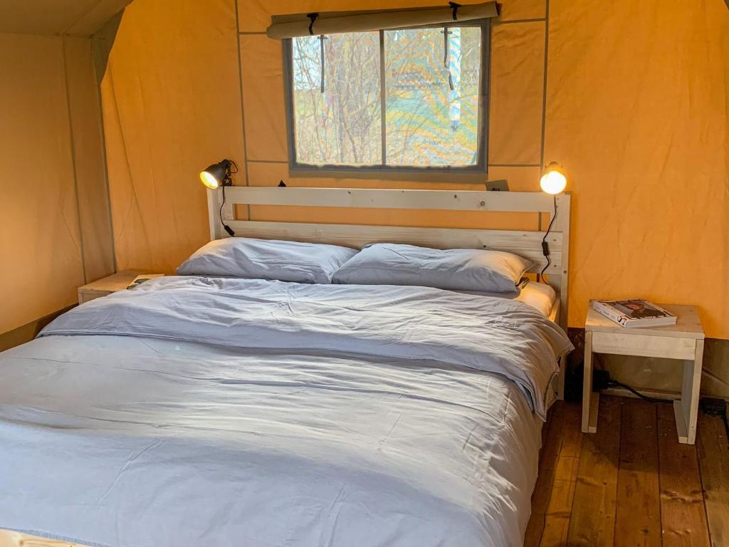 Postel nebo postele na pokoji v ubytování Ostseecamping Peenemündung