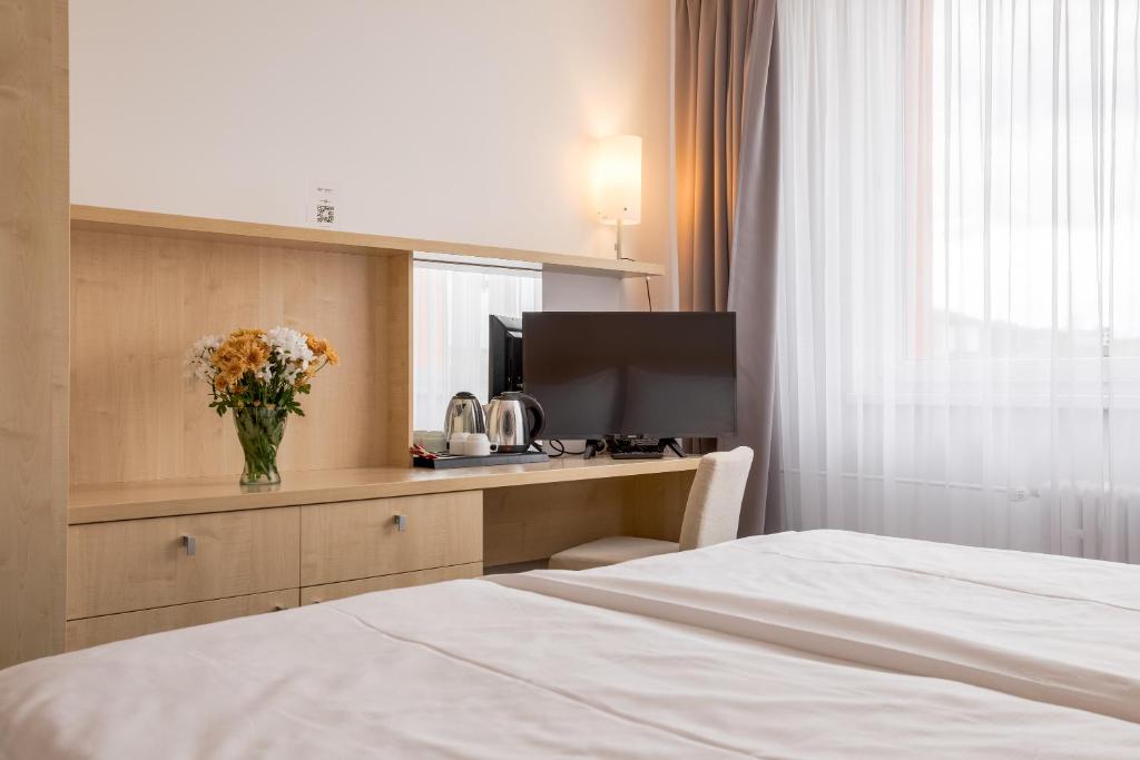 Postel nebo postele na pokoji v ubytování Hotel Vista