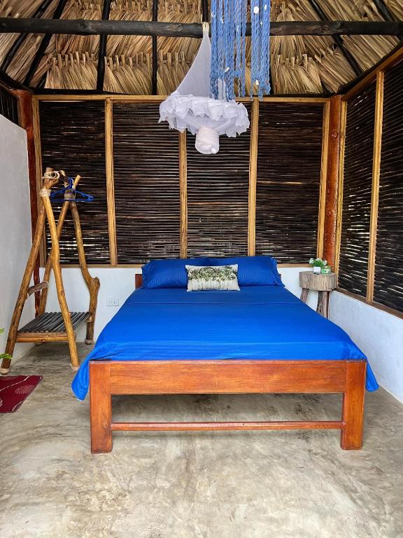 Voodi või voodid majutusasutuse Hospedaje VILLA CRETA toas