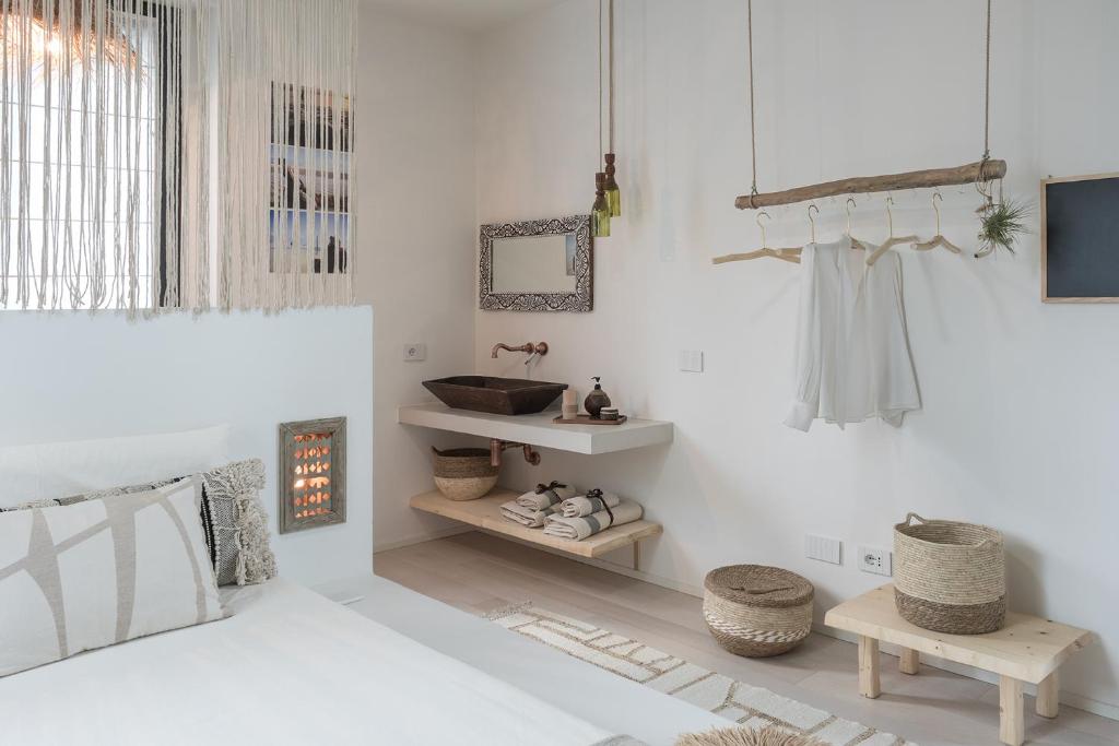 Postel nebo postele na pokoji v ubytování Saso' - Casa di charme e relax