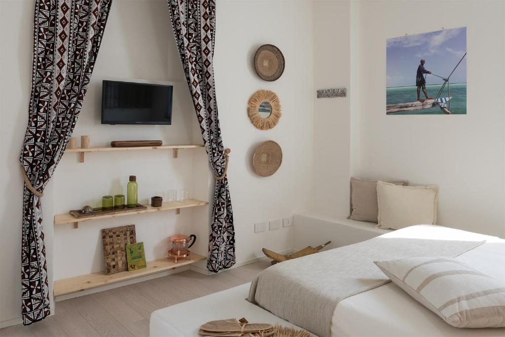 TV a/nebo společenská místnost v ubytování Saso' - Casa di charme e relax