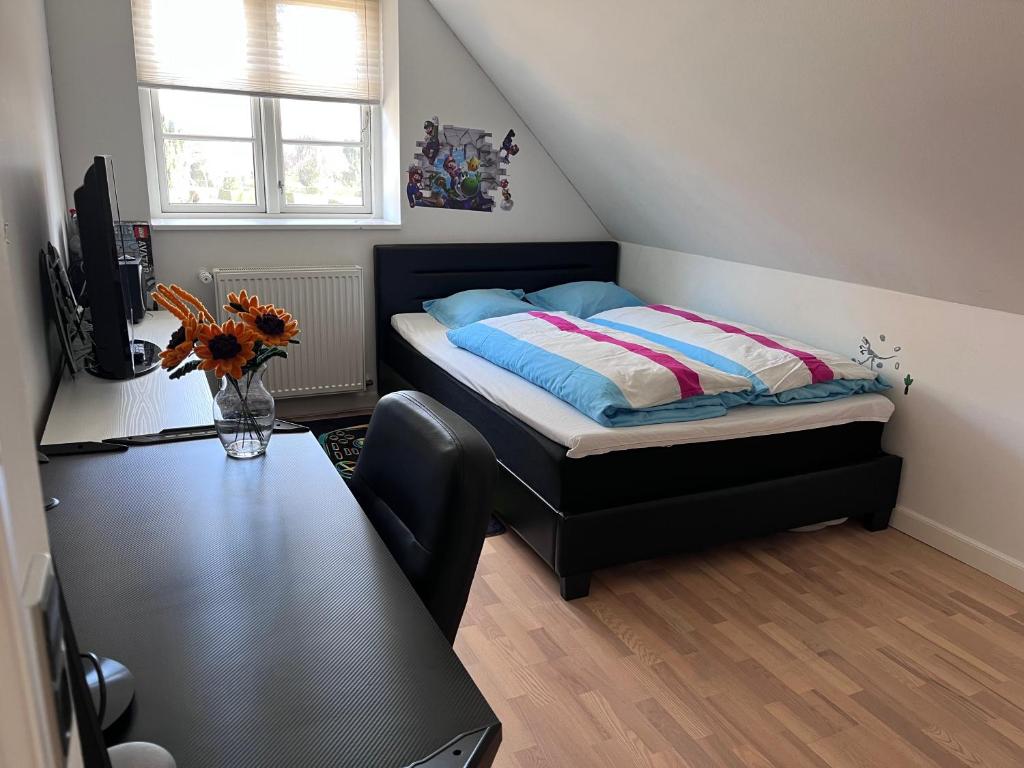Postel nebo postele na pokoji v ubytování Lovely villa apartment in Vejstrup