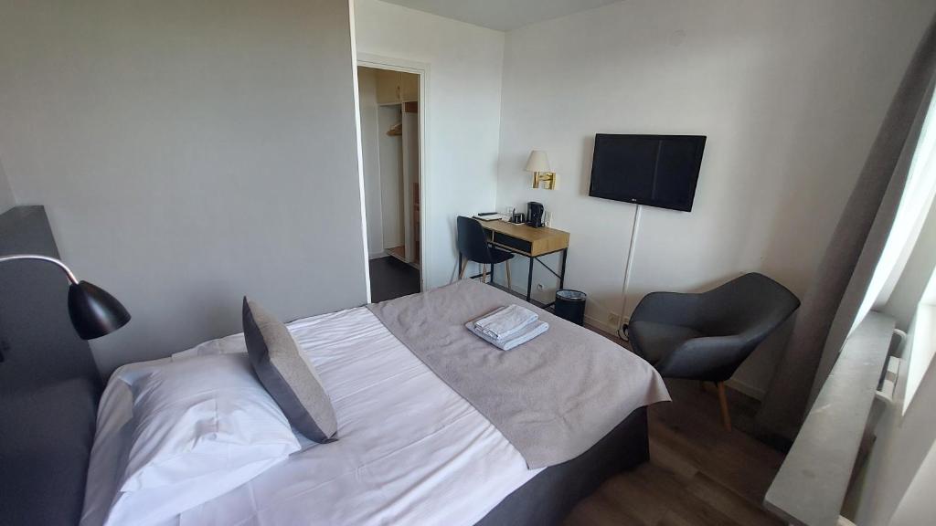 TV a/nebo společenská místnost v ubytování Hotel Bishops Arms Mora