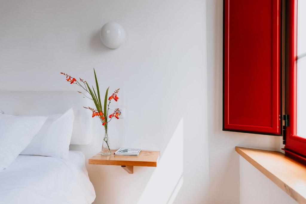 Postel nebo postele na pokoji v ubytování Hotel El Castaño Dormilón