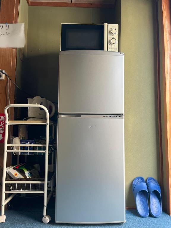 Kuchyň nebo kuchyňský kout v ubytování Guesthouse Hikari