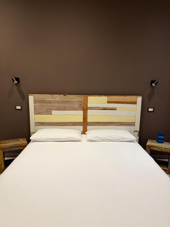 Posteľ alebo postele v izbe v ubytovaní Adrian's B&B