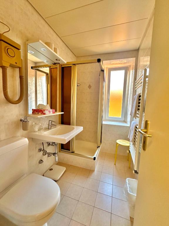 Koupelna v ubytování Hotel Colibrì