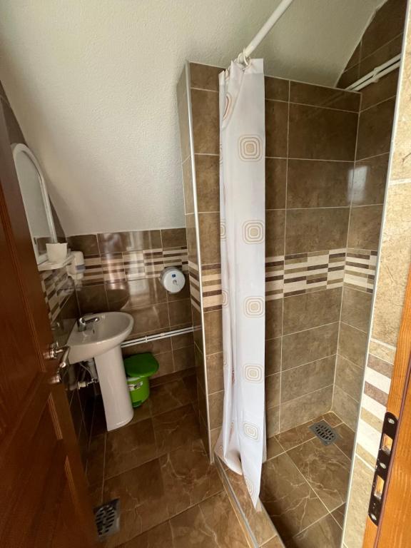 Koupelna v ubytování Hotel Lovac