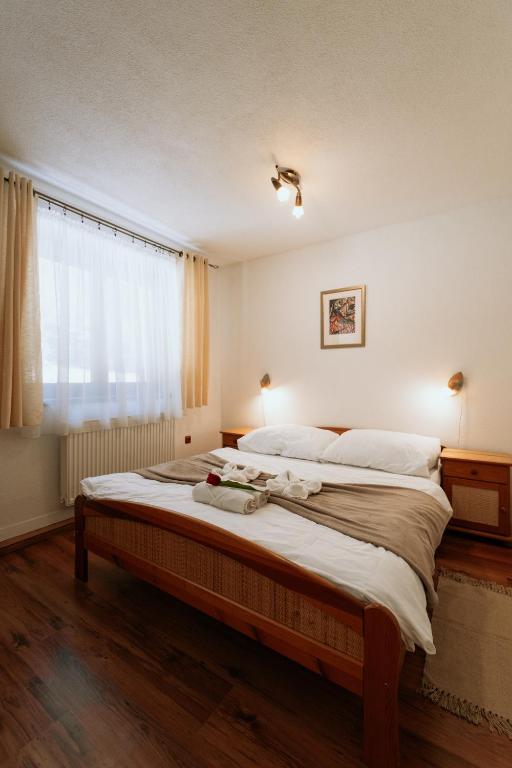 Voodi või voodid majutusasutuse Horský hotel Bartoška toas