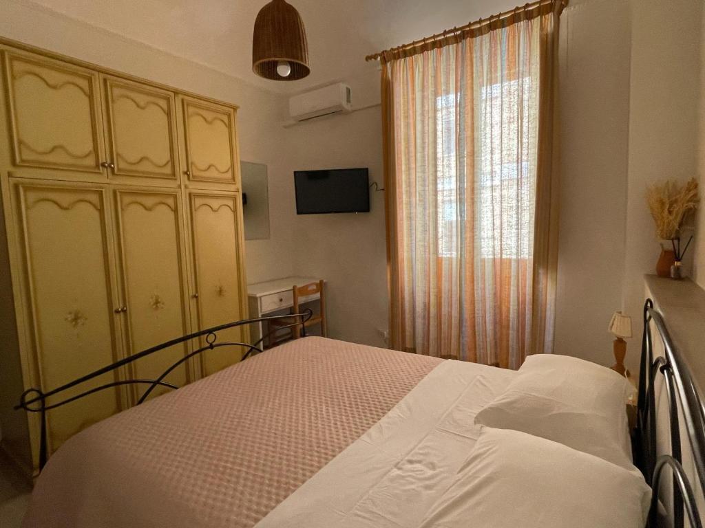 Postel nebo postele na pokoji v ubytování Mady's Guesthouse