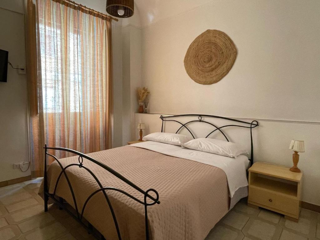 Postel nebo postele na pokoji v ubytování Mady's Guesthouse