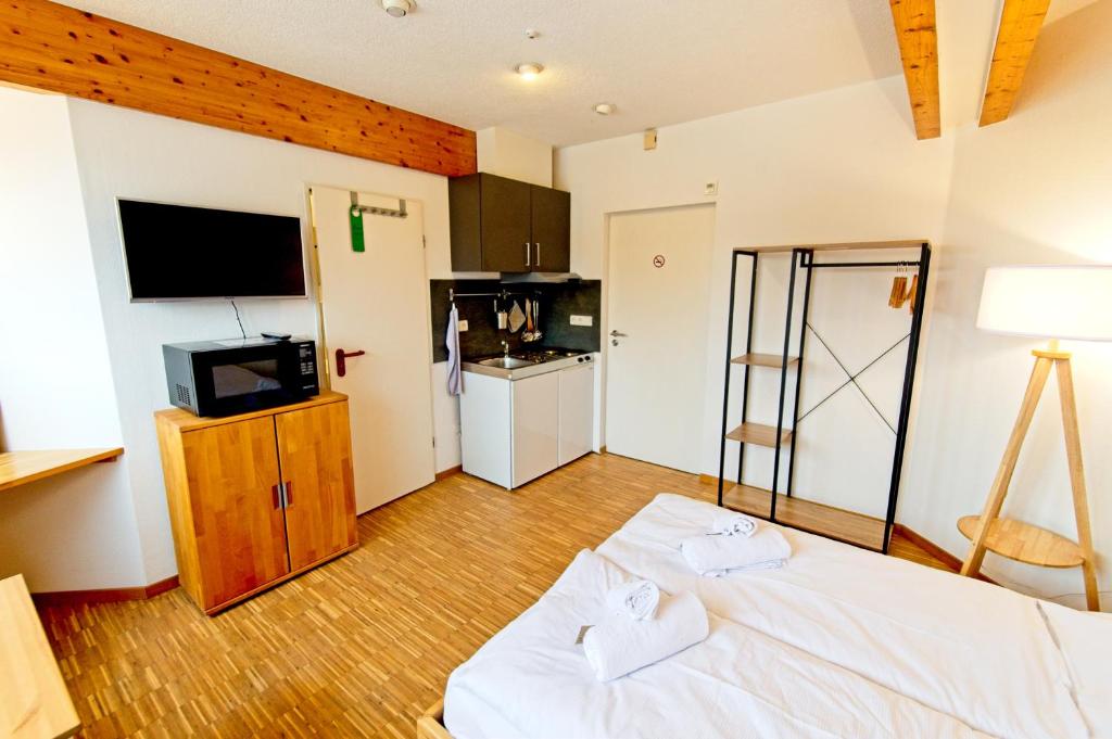 Kuchyň nebo kuchyňský kout v ubytování Boardinghouse Steinen