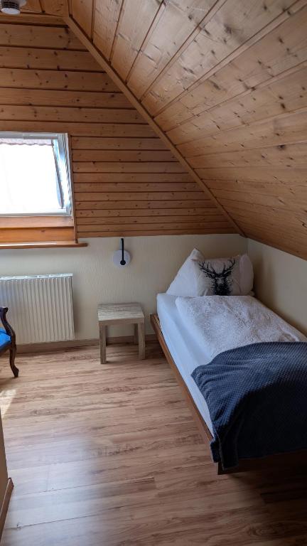 Una cama o camas en una habitación de Hotel Harder Minerva