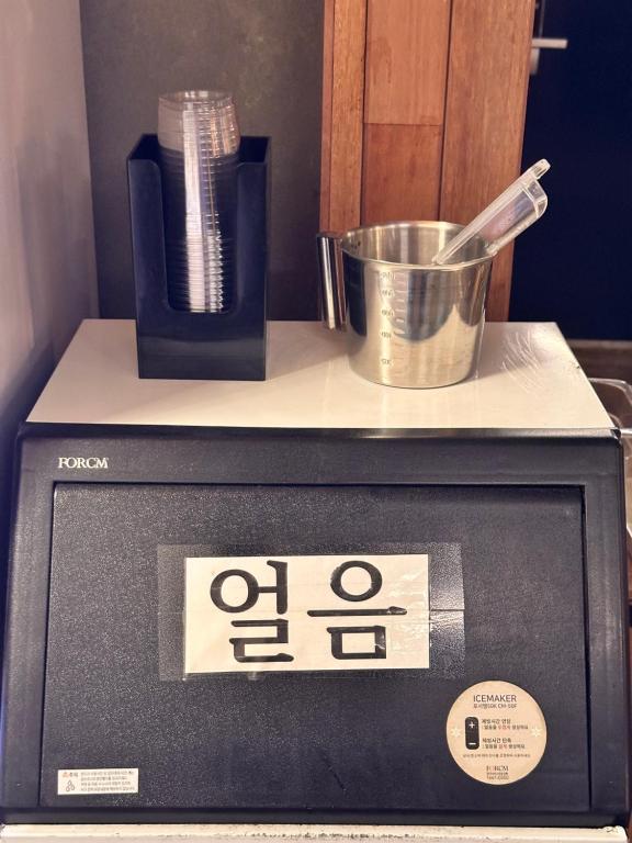 Kuchyň nebo kuchyňský kout v ubytování Stay Cozy 스테이 하우스