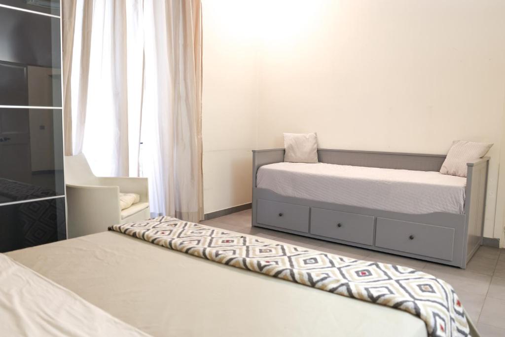 Letto o letti in una camera di Domus Superior Domizio - Pantheon