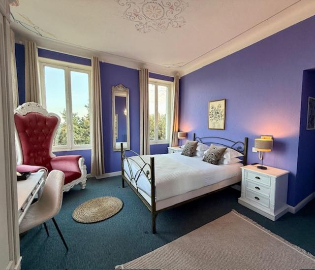 Postel nebo postele na pokoji v ubytování Hôtel Miramar