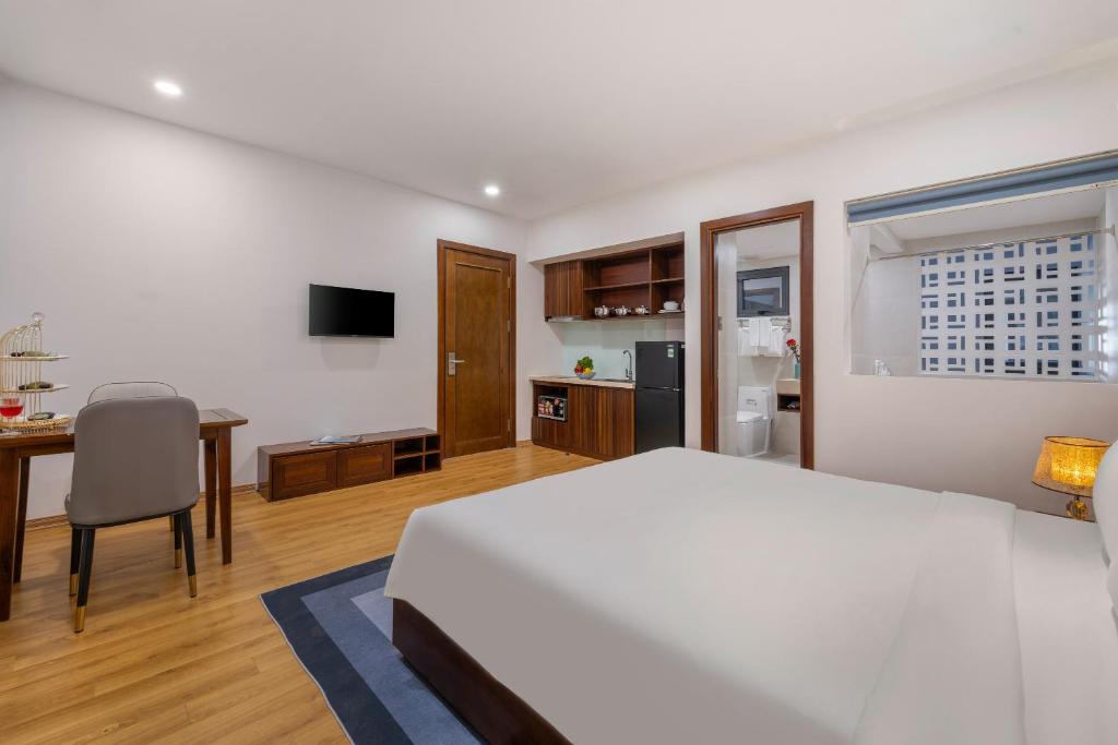 TV a/nebo společenská místnost v ubytování Dana Boutique Hotel & Apartment