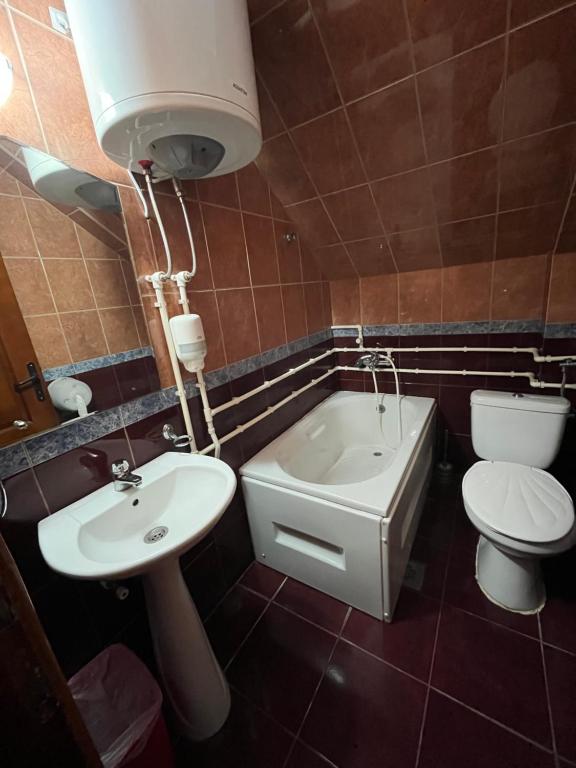 Koupelna v ubytování Hotel Lovac