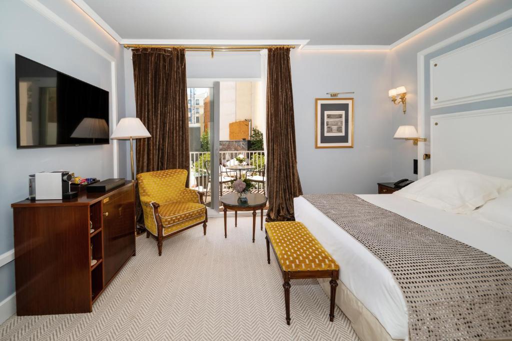 Postel nebo postele na pokoji v ubytování Wellington Hotel & Spa Madrid