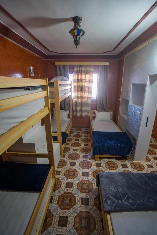 Postel nebo postele na pokoji v ubytování Fu SPACE