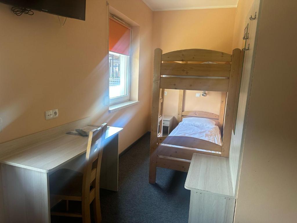 Postel nebo postele na pokoji v ubytování Hostel Żywiec