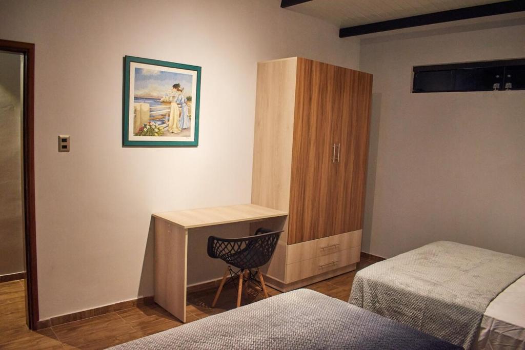 Postel nebo postele na pokoji v ubytování Residencia Erimatt