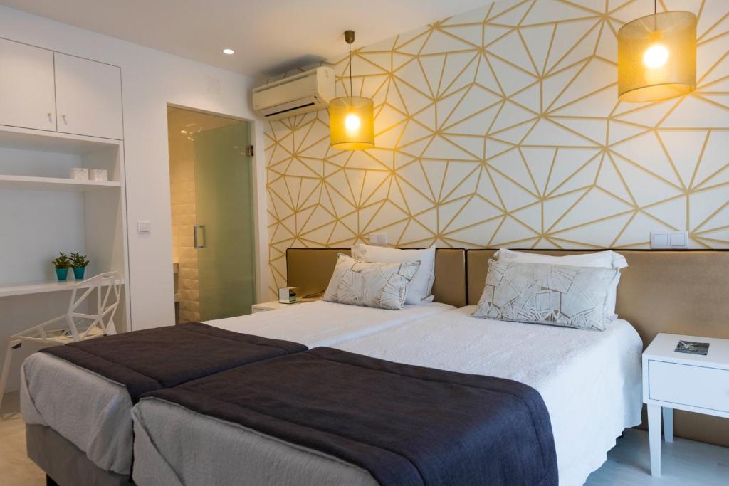 Postel nebo postele na pokoji v ubytování Hotel Magic